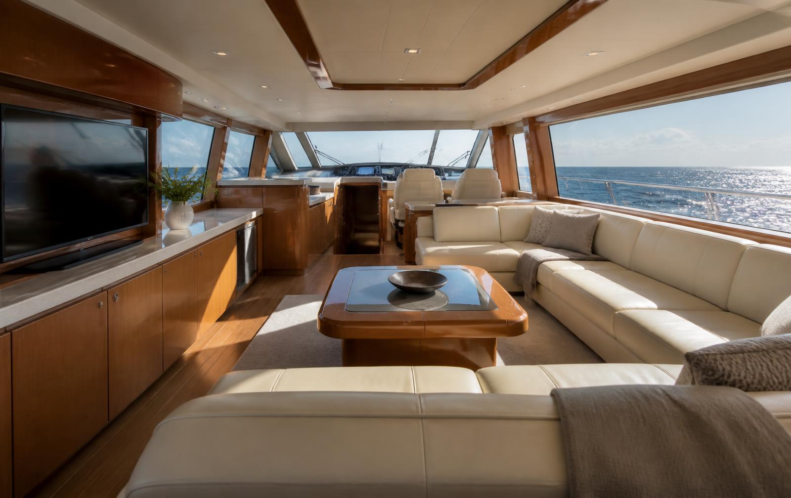 Luxury yacht interior salon with panoramic sea windows